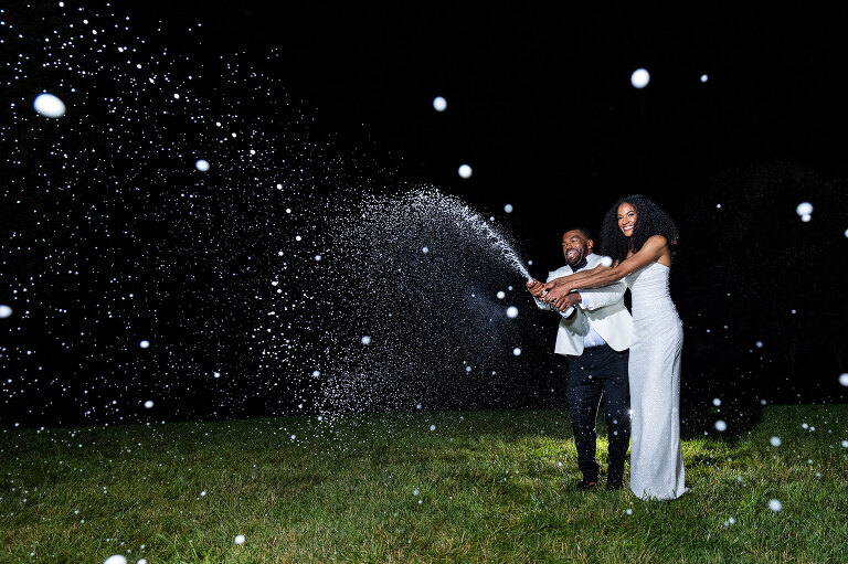 Wine & Country Weddings best Cville wedding photographer champagne spray